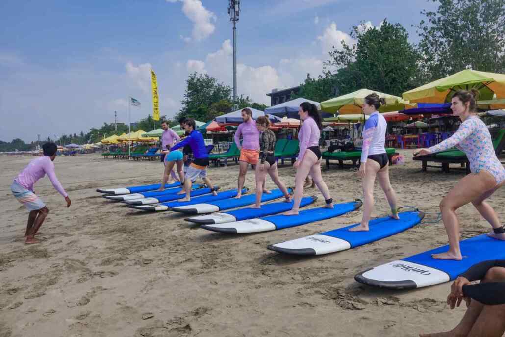 Students learning beginner surf in bali